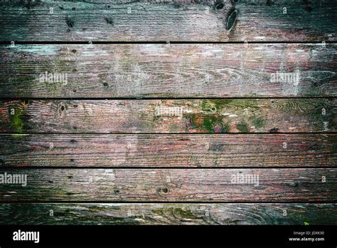 Wooden Fence Covered By Moss Background And Texture Stock Photo Alamy