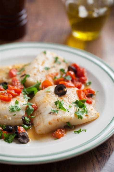 Recette Papillotes de merlan aux olives et à la tomate Marie Claire