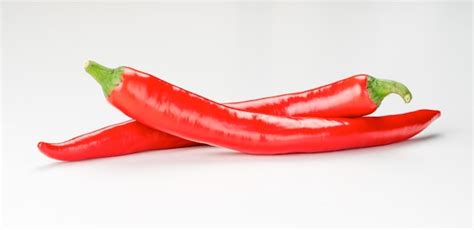 Premium Photo Two Ripe Chili Pepper Isolated On White Background Red