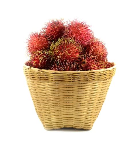 Premium Photo Rambutan On Basket Wooden Isolated And White Background