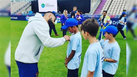 Virat Kohli Spends Time With School Children During Cricket Clinic - News18