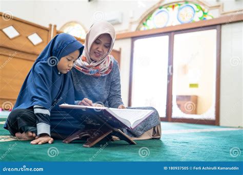 Muslim Woman With Kids Reading Quran Together Stock Image Image Of