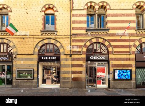 Alba, Italy - August 20, 2023: Geox footwear store in historic building ...