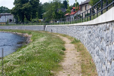 Modern Flood Protection Wall In The Style Of The Historic City Wall