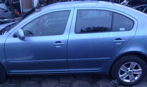 SKODA OCTAVIA II DRZWI LEWE PRZEDNIE TYLNE 9154 7006127715