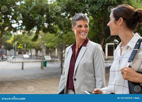 Happy Smiling Business People Talking Outdoors Stock Photo - Image of ...