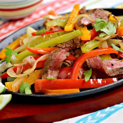 Grilled Steak Fajitas Cooking With Curls