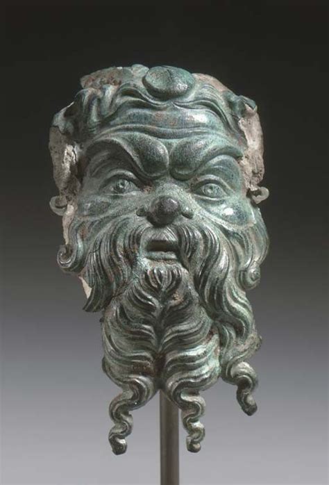 A GREEK BRONZE PAN APPLIQUÉ CLASSICAL PERIOD CIRCA 4TH CENTURY B C