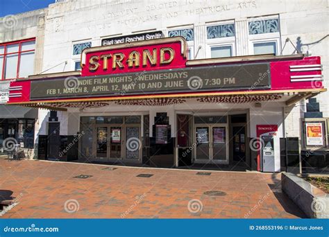 Earl And Rachel Smith Strand Theatre With A Red Brick Sidewalk Lined With Shops Restaurants And