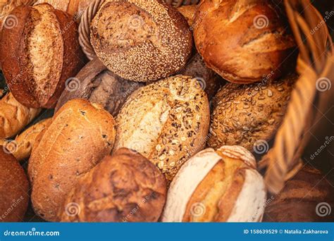 Different Kinds Of Freshly Baked Bread May Use As Background Top View Rustic Loaves Of Bread