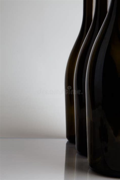 Three bottles stock photo. Image of objects, wine, reflection - 29307996