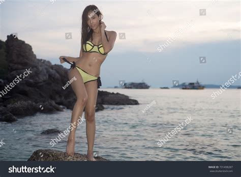 Sexy Asian Woman Yellow Bikini Two Stock Photo 731498287 Shutterstock