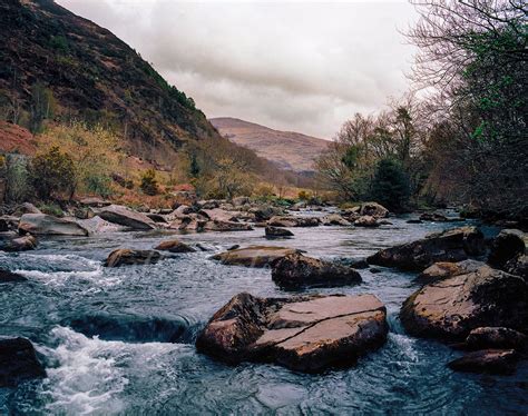 rocky blue river  snowdonia wales photo print lost kat photography