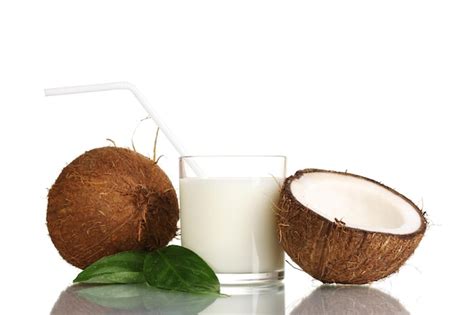 Premium Photo | Coconut milk and coconut isolated on white