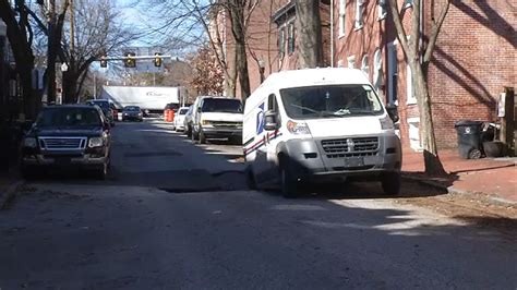 Mail Truck Partially Swallowed Up By Sinkhole On Wilmington Delaware