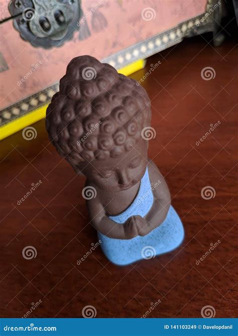 Little Buddha Statue In Blue Clothes Meditation Stock Image Image