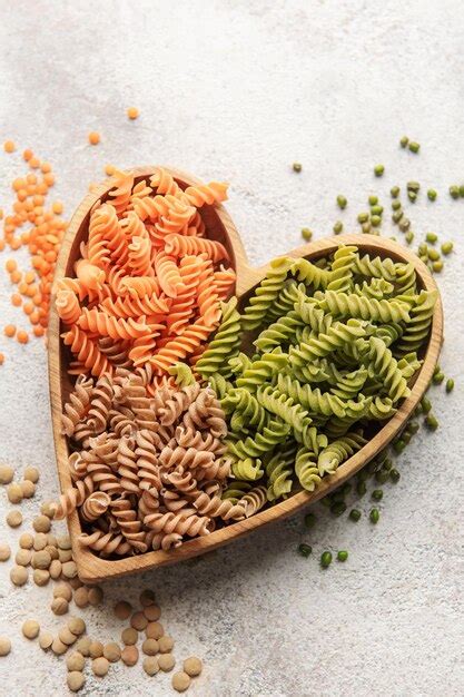 Premium Photo A Variety Of Fusilli Pasta Made From Different Types Of