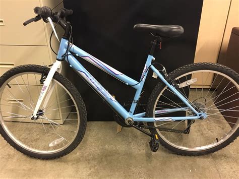 Blue Huffy Granite 18 Speed Mountain Bike