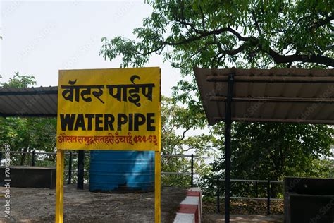 Picture Of Board Of Water Pipe Railway Station Which Is On The Way Of