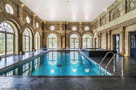 Stunning mansion boasting its own cinema bowling alley two swimming ...