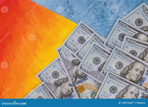 Hundred Dollar Banknotes Isolated On Rainbow Background Stock Image