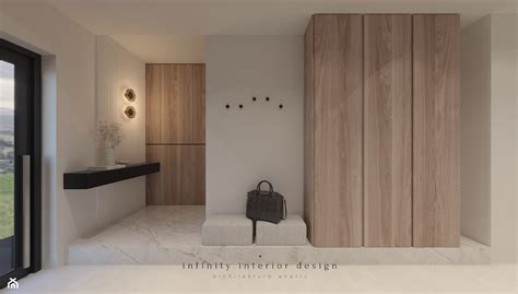 Przedpokój z dużą szafą i siedziskiem zdjęcie od Infinity Interior