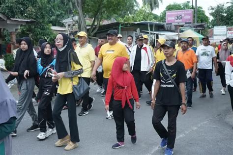 Wakil Bupati Asahan Lepas Gerak Jalan Sehat Gebyar HUT Ke 58 Partai