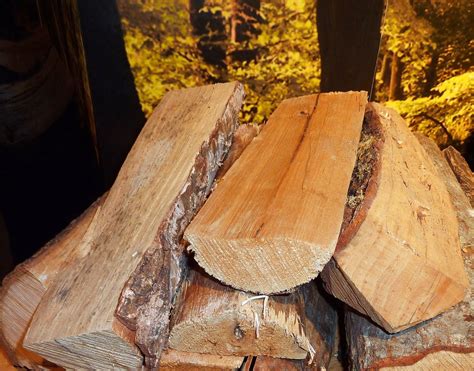 A Pile Of Wood Sitting On Top Of A Table Burn Firewood Fire