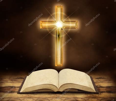 Bible And Glowing Crucifix On Dark Wooden Background Stock Photo By