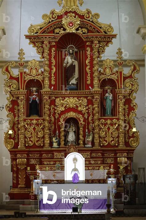 Image of Altar and reredos in a catholic church, Cotacachi, Ecuador(photography)