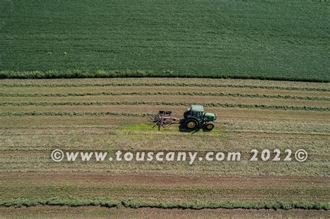 Raking Hay with a Rotary Hay Rake - Touscany Creative Media