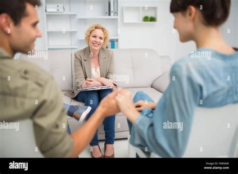 Psychologist Helping A Couple With Relationship Difficulties Stock