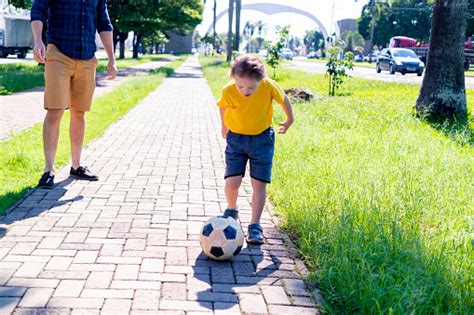 Boy With Down Syndrome Playing Stock Photo - Download Image Now - Down ...