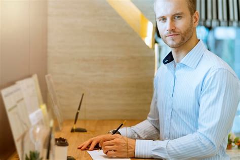 Premium Photo Portrait Of Handsome Businessman Working In Office