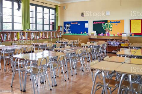 Elementarysize Desks And Chairs In Unoccupied Classroom Stock Photo ...