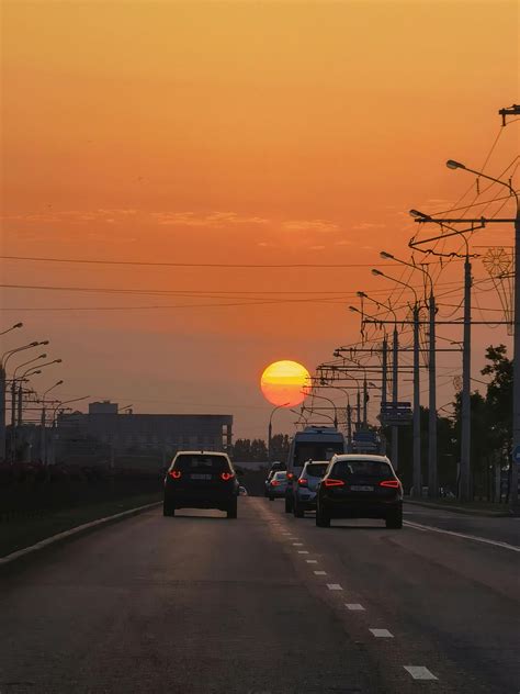 Vehicle on Road during Sunset · Free Stock Photo