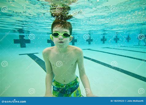 Boy Swimming Underwater Stock Photos - Image: 18259523