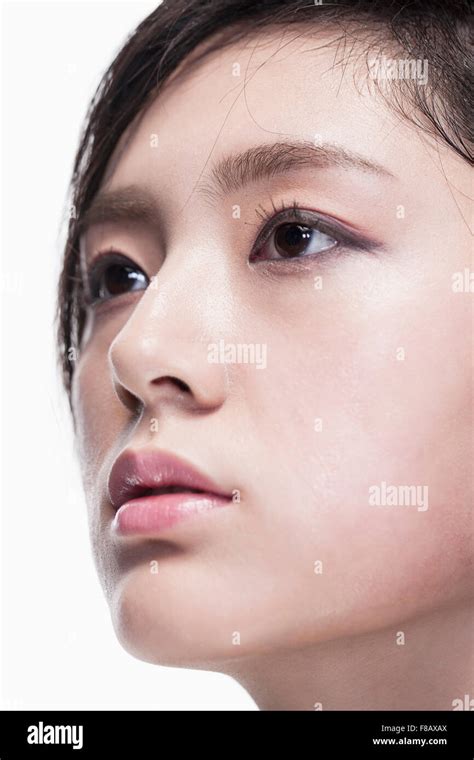 Close Up Of Young Womans Face Looking Up Stock Photo Alamy