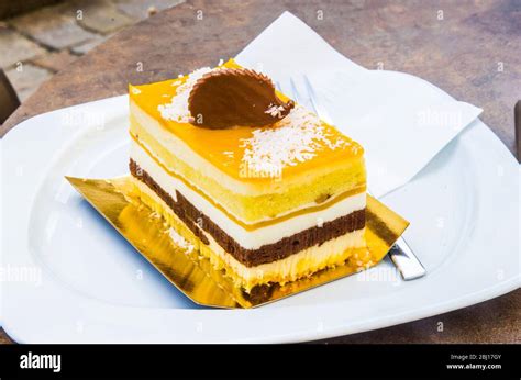 Chocolate Parfait Sponge Cake Cream And Mango With A Milk Chocolate