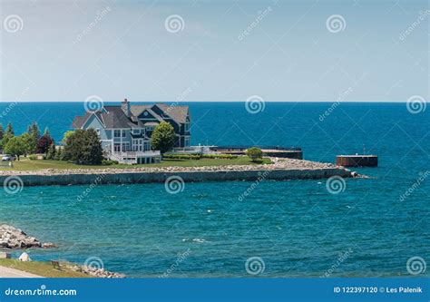 Two Waterfront Homes on a Large Lake Stock Photo - Image of shore ...