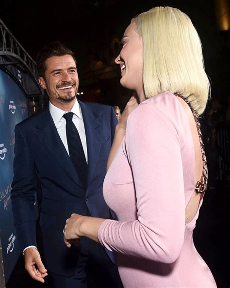 Katy Perry Kisses Orlando Bloom During Rare Red Carpet Appearance