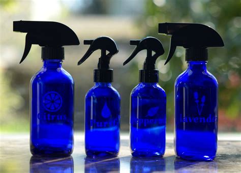 Set of Etched Blue Glass Spray Bottles for use with Essential