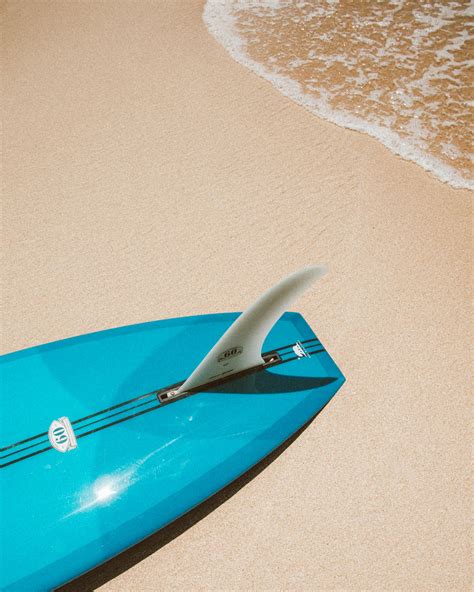 Blue Surfboard On White Sand Beach · Free Stock Photo