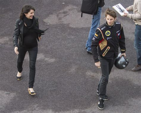 Photo Romain Grosjean et Marion Jollès dans le paddock du Grand Prix