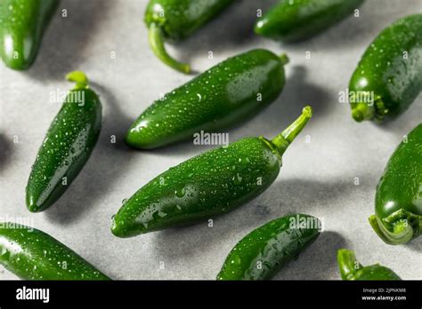 Raw Green Organic Jalapeno Peppers Ready To Cook With Stock Photo Alamy