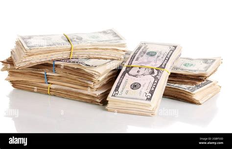 Stacks of dollars isolated on white Stock Photo - Alamy