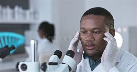 Scientist Laboratory Conducts Research Types Keyboard And Writes Down