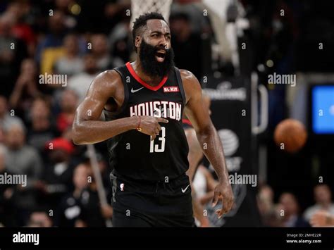 Houston Rockets guard James Harden (13) reacts to a play during overtime of an NBA basketball ...