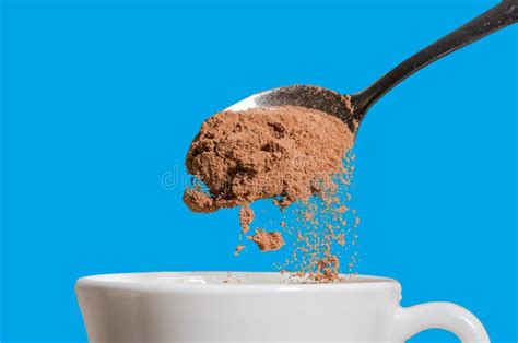 Spoon Cocoa into a White Mug Stock Photo - Image of colors, brown ...