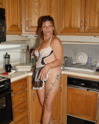 Experienced Blonde Lady Ivee Showing Off Thong Adorned Butt In Kitchen